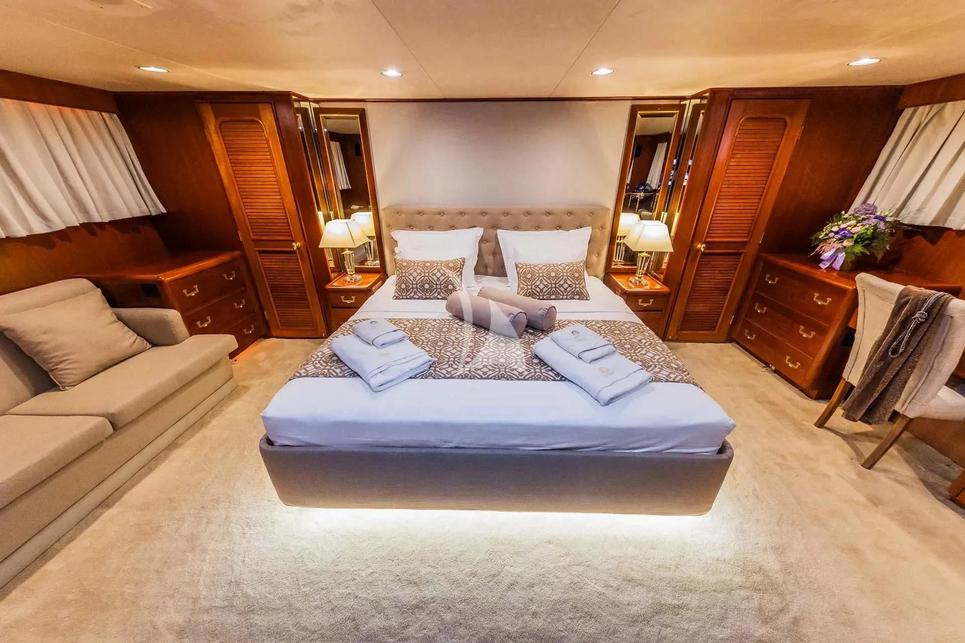a large bedroom with a bed aboard AURIANE Yacht for Sale