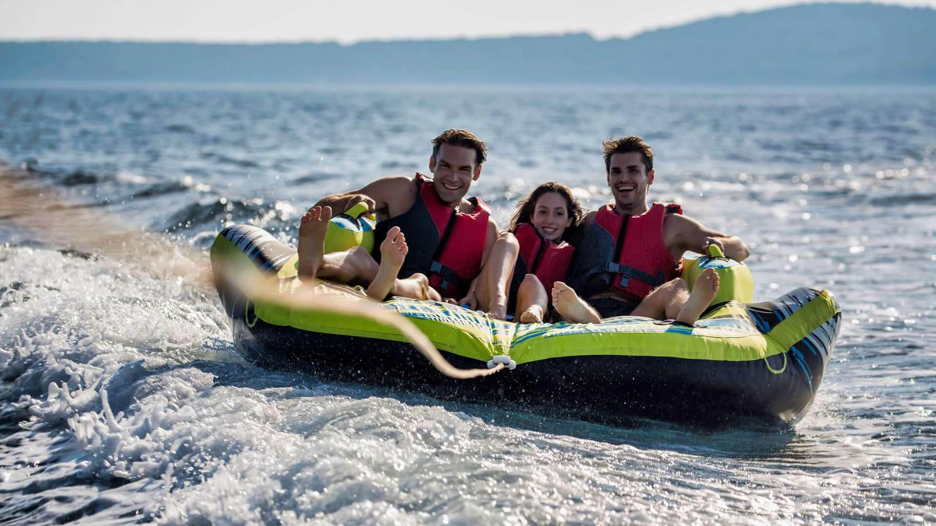a group of people on a raft in the water aboard AURIANE Yacht for Sale