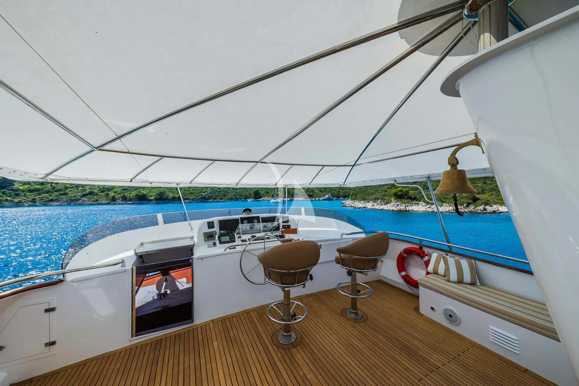 a boat with a table and chairs on a deck aboard AURIANE Yacht for Sale