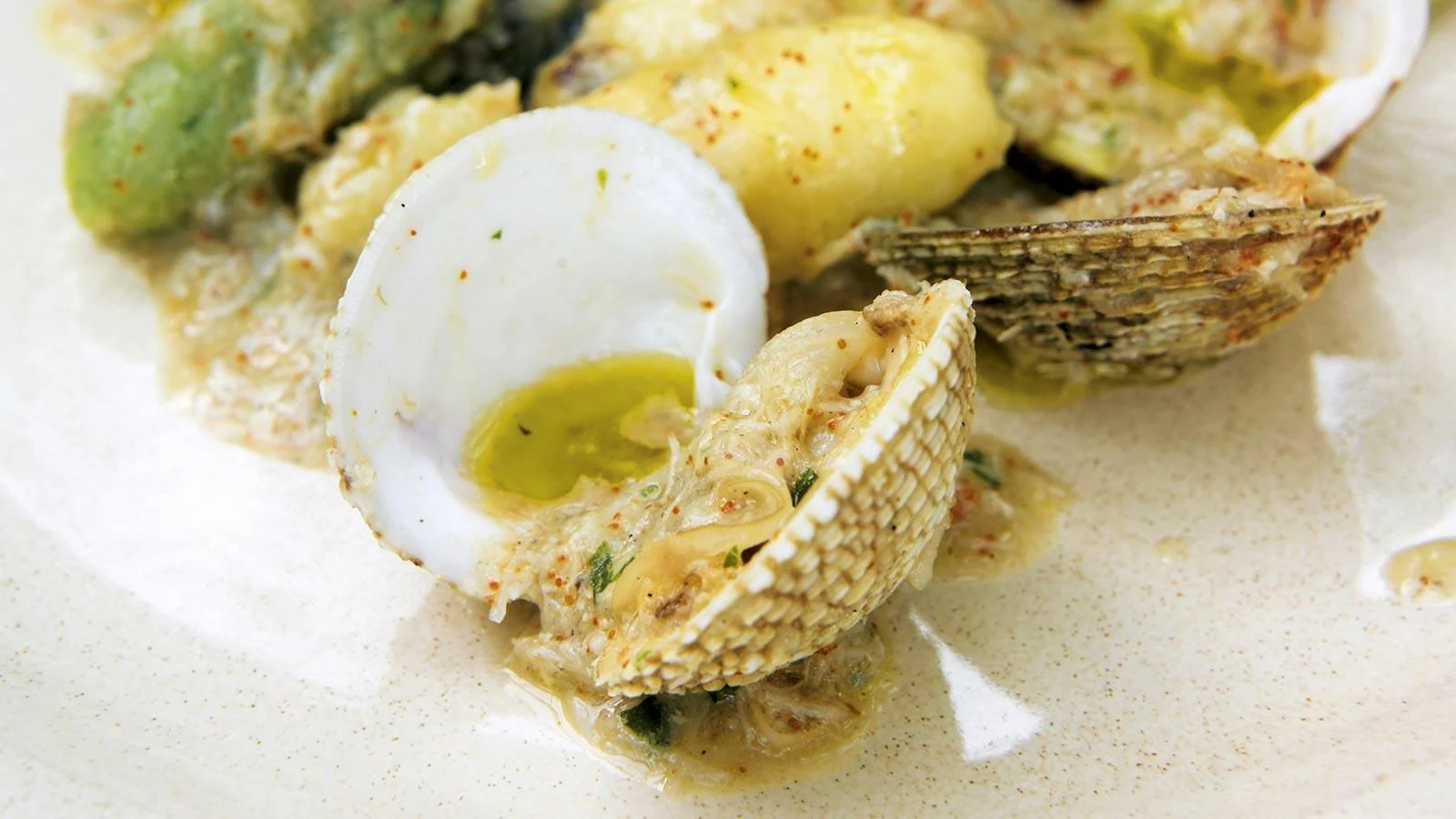 a plate of food aboard AURIANE Yacht for Sale