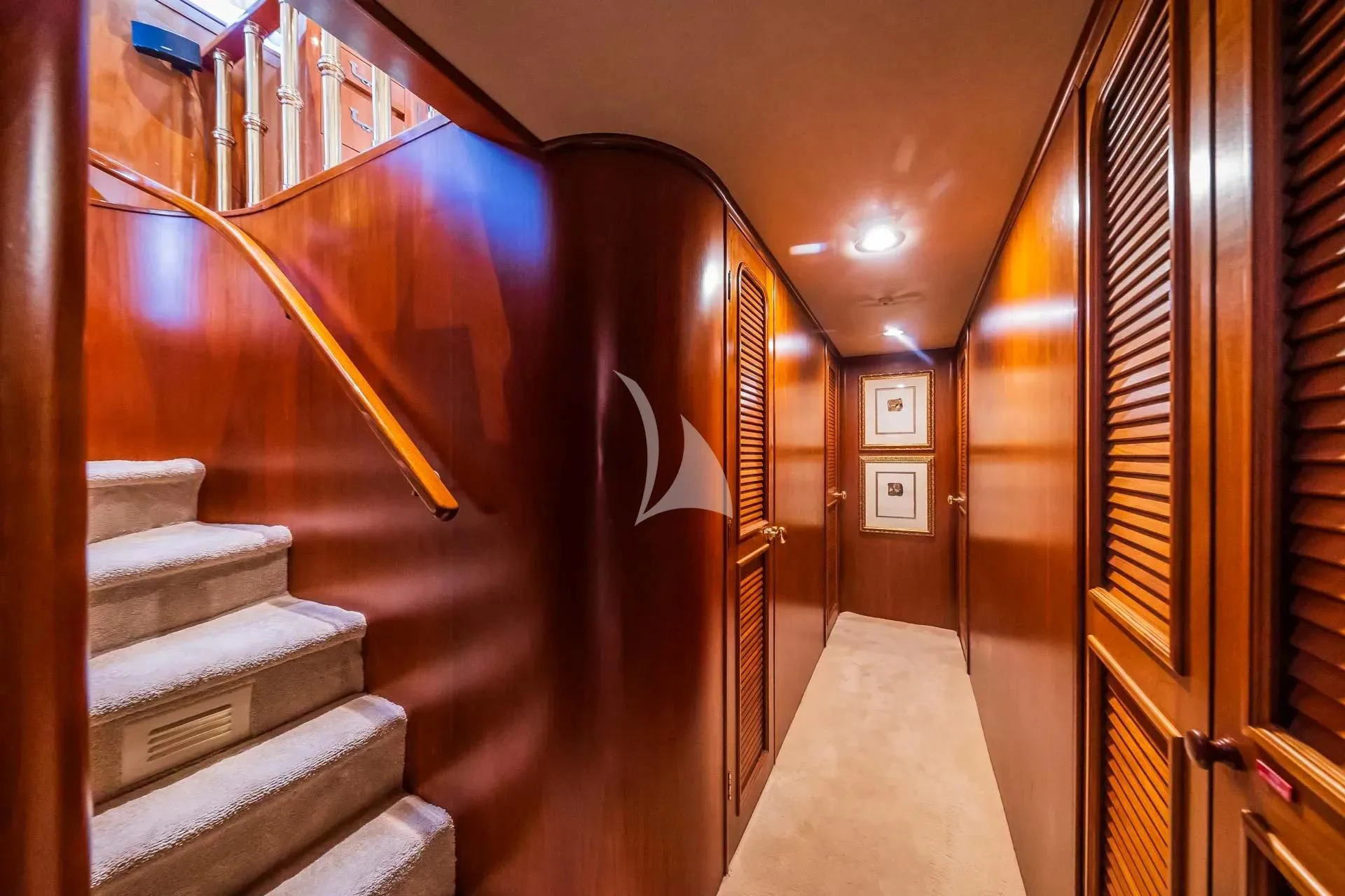 a staircase with a railing aboard AURIANE Yacht for Sale