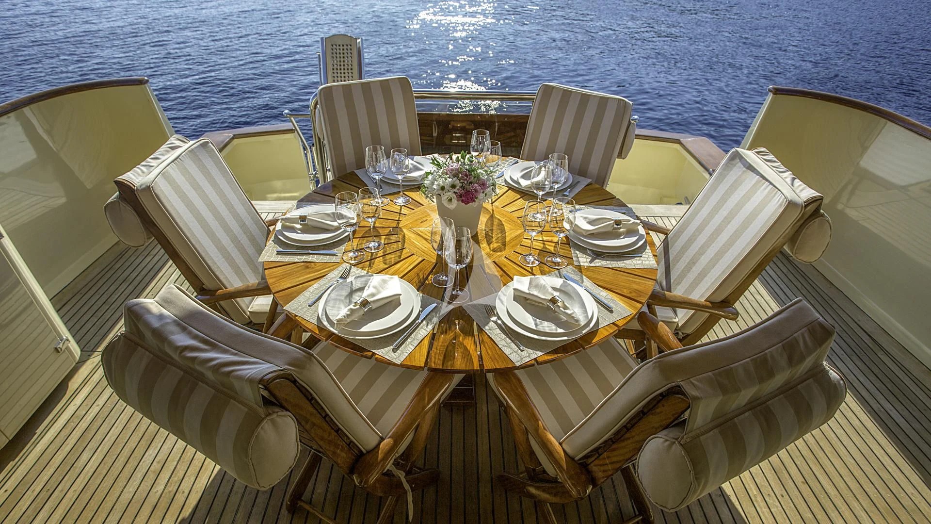 a table set for a dinner aboard AURIANE Yacht for Sale