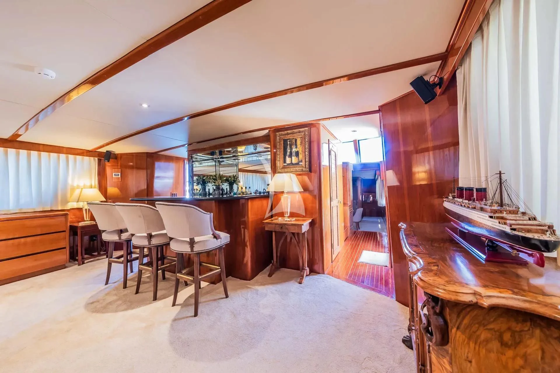 a room with a table and chairs aboard AURIANE Yacht for Sale