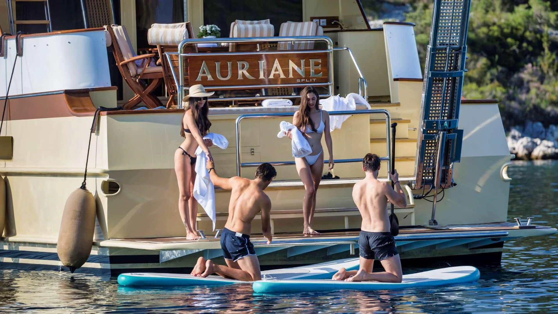 a group of people playing in a pool aboard AURIANE Yacht for Sale