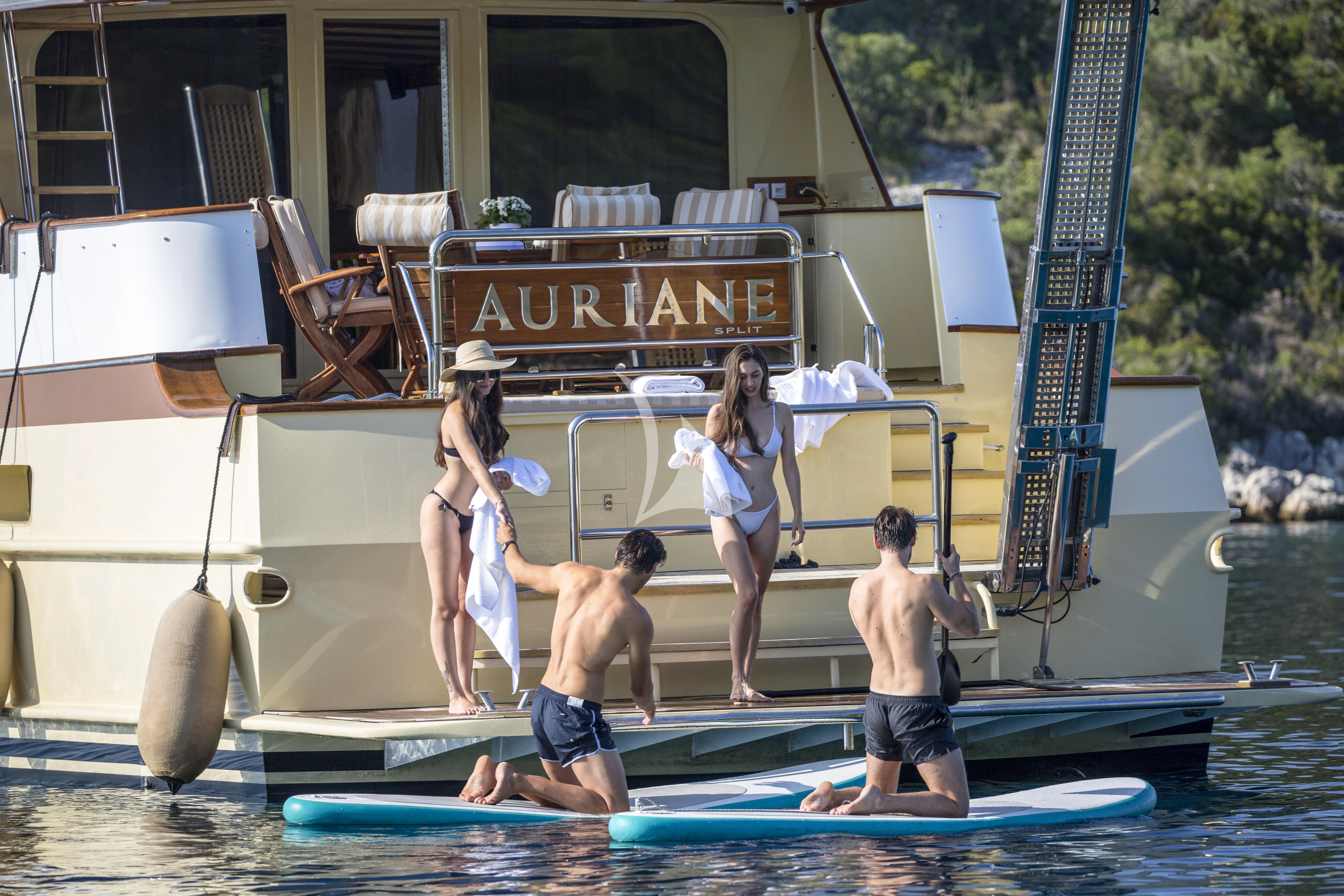 a group of people playing in a pool aboard AURIANE Yacht for Sale