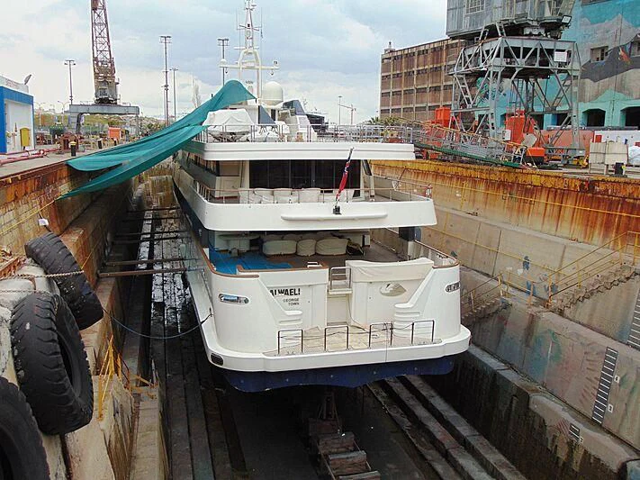 a boat docked at a port aboard ALWAELI Yacht for Sale