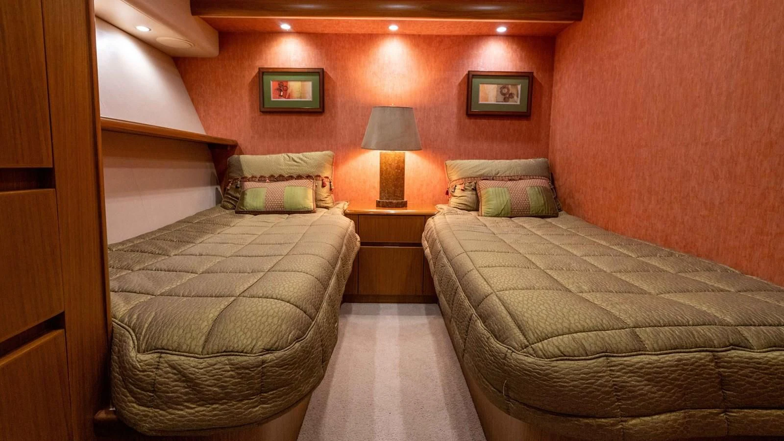 a couple of beds in a hotel room aboard DONE DEAL Yacht for Sale