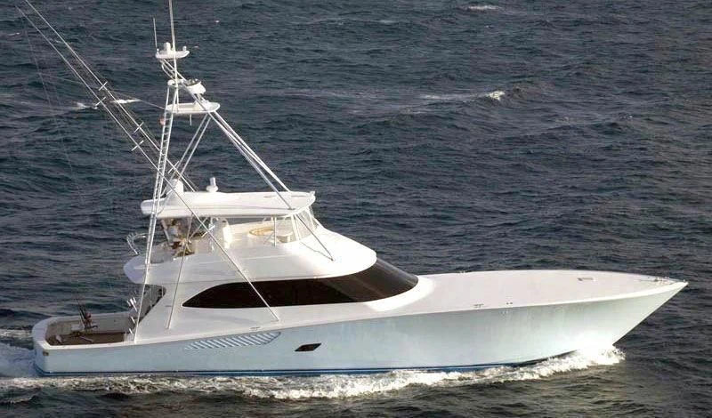a white boat in the water aboard DONE DEAL Yacht for Sale