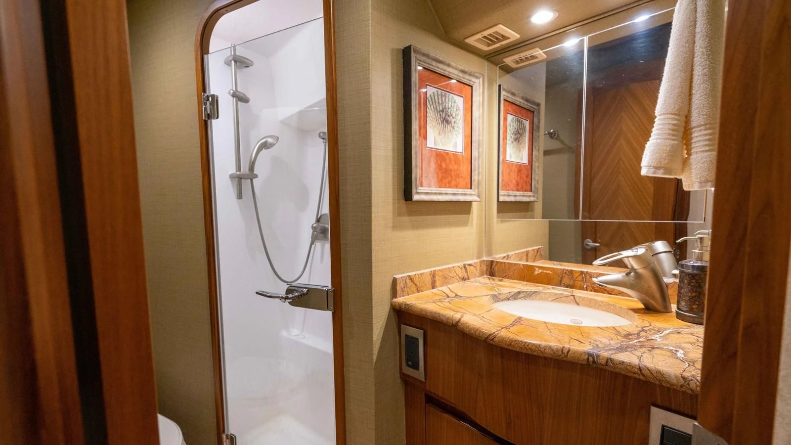 a bathroom with a sink and a shower aboard DONE DEAL Yacht for Sale