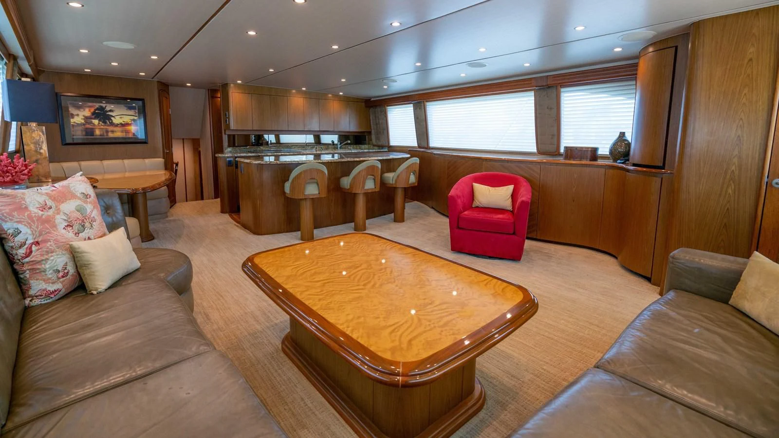 a living room with a table and chairs aboard DONE DEAL Yacht for Sale