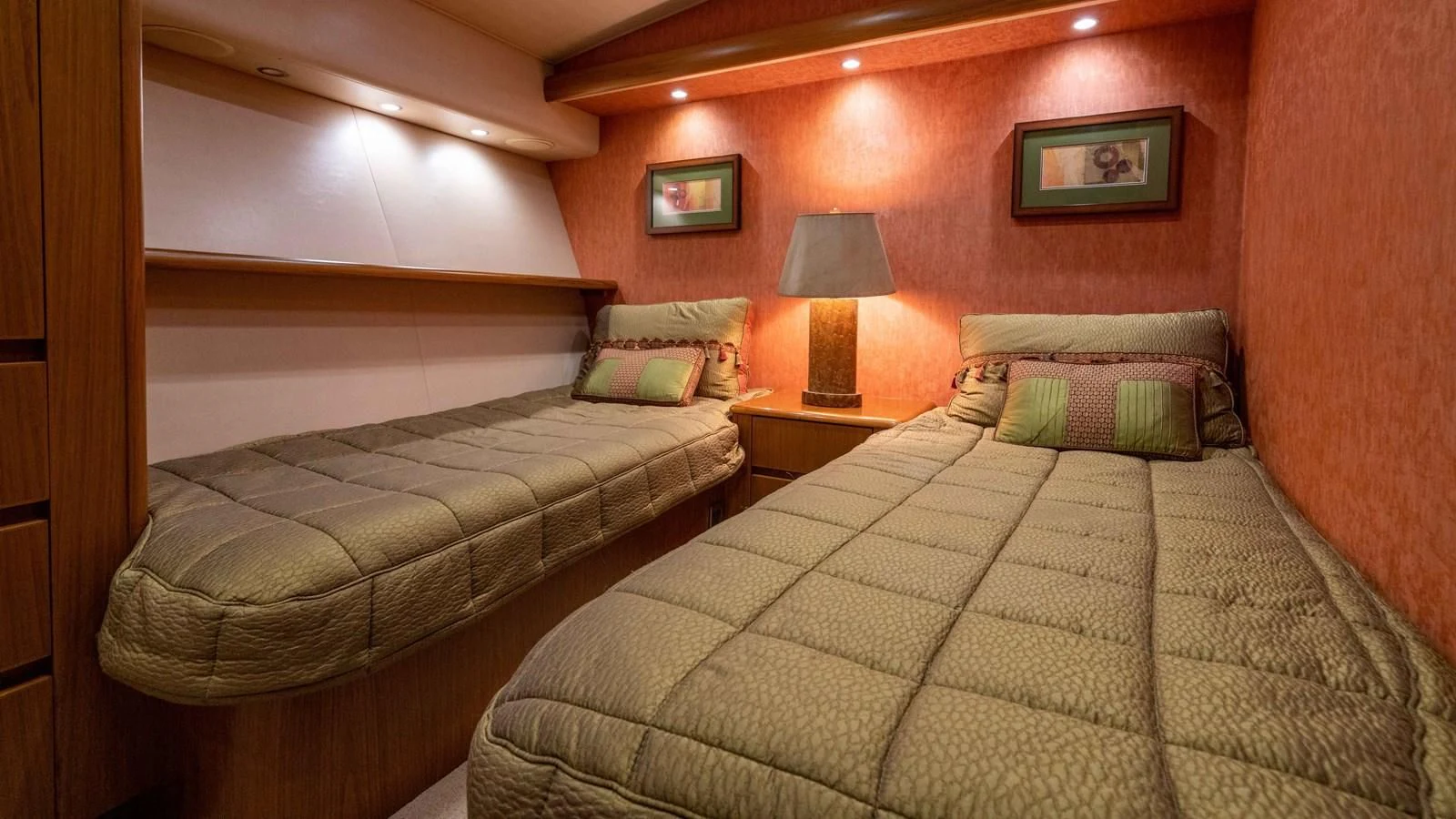 a couple of beds in a hotel room aboard DONE DEAL Yacht for Sale