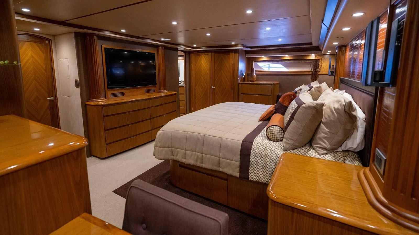 a room with a bed and a tv aboard DONE DEAL Yacht for Sale