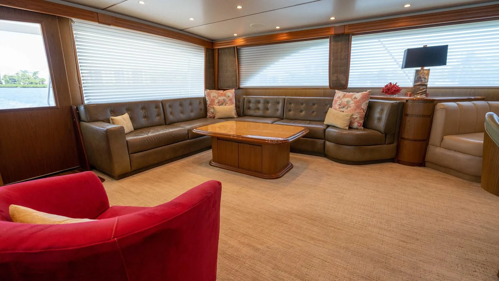 a living room with a couch and a coffee table aboard DONE DEAL Yacht for Sale
