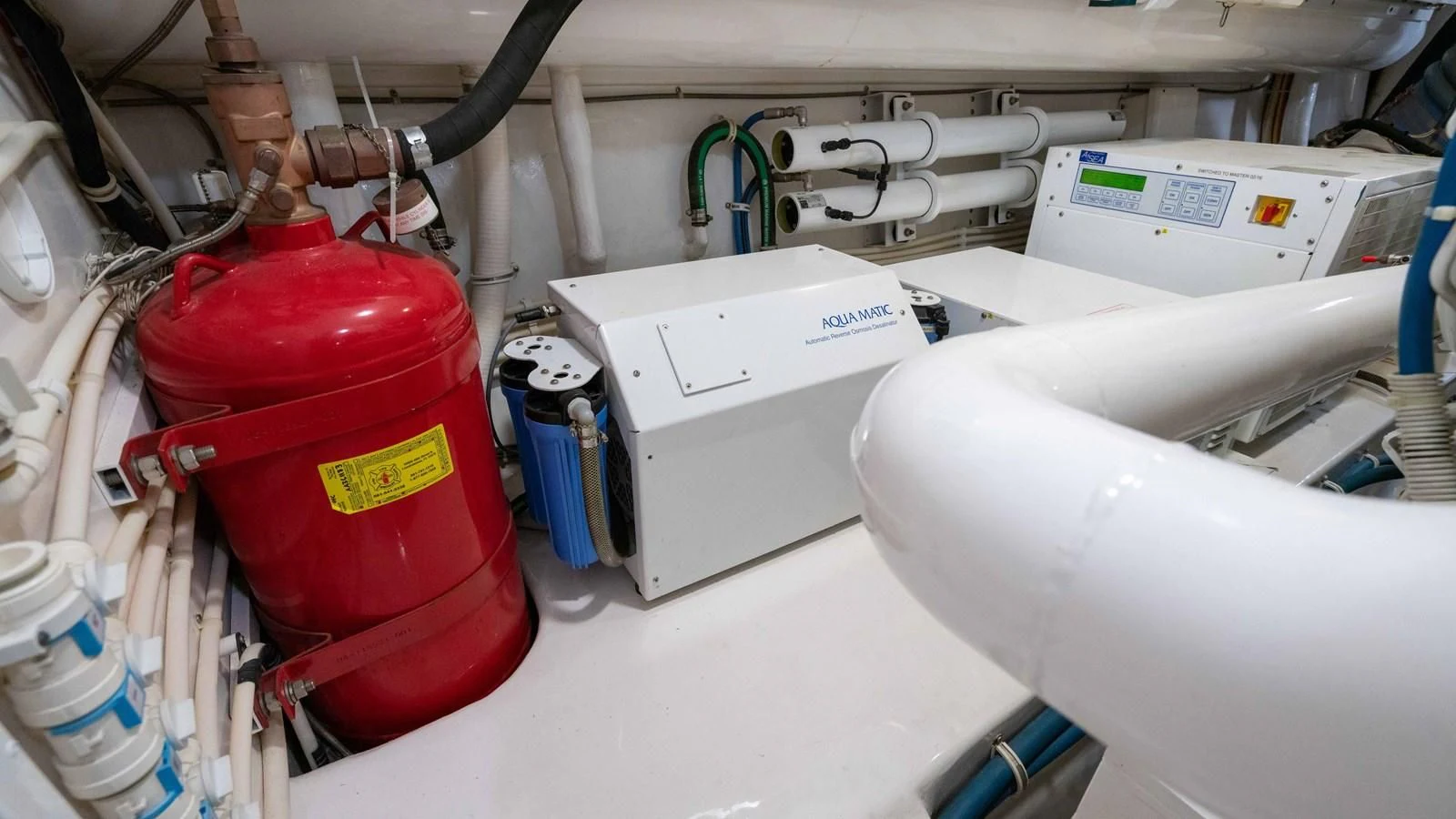 a red and white machine aboard DONE DEAL Yacht for Sale