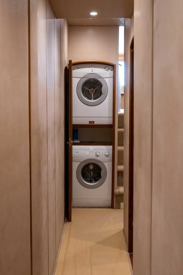 a washer and dryer in a room aboard DONE DEAL Yacht for Sale