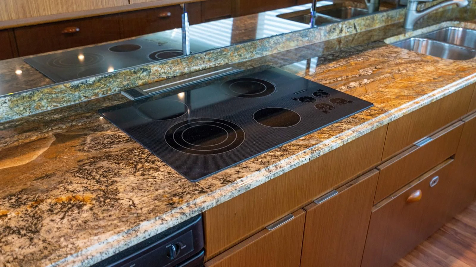 a kitchen with granite counter tops aboard DONE DEAL Yacht for Sale