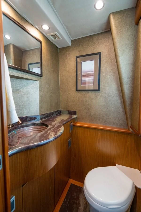 a bathroom with a marble counter top aboard DONE DEAL Yacht for Sale