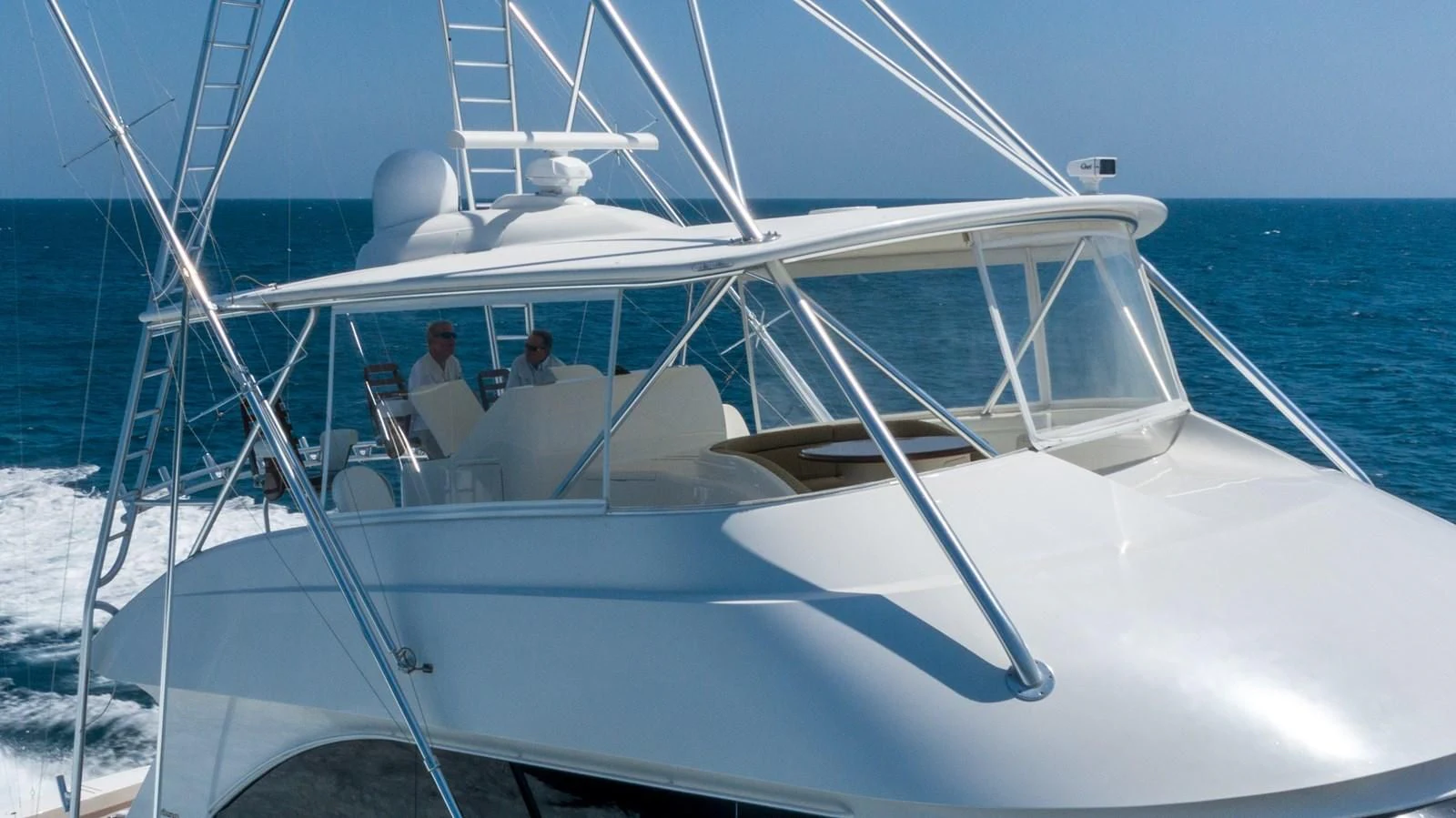 a white boat with people on it aboard DONE DEAL Yacht for Sale