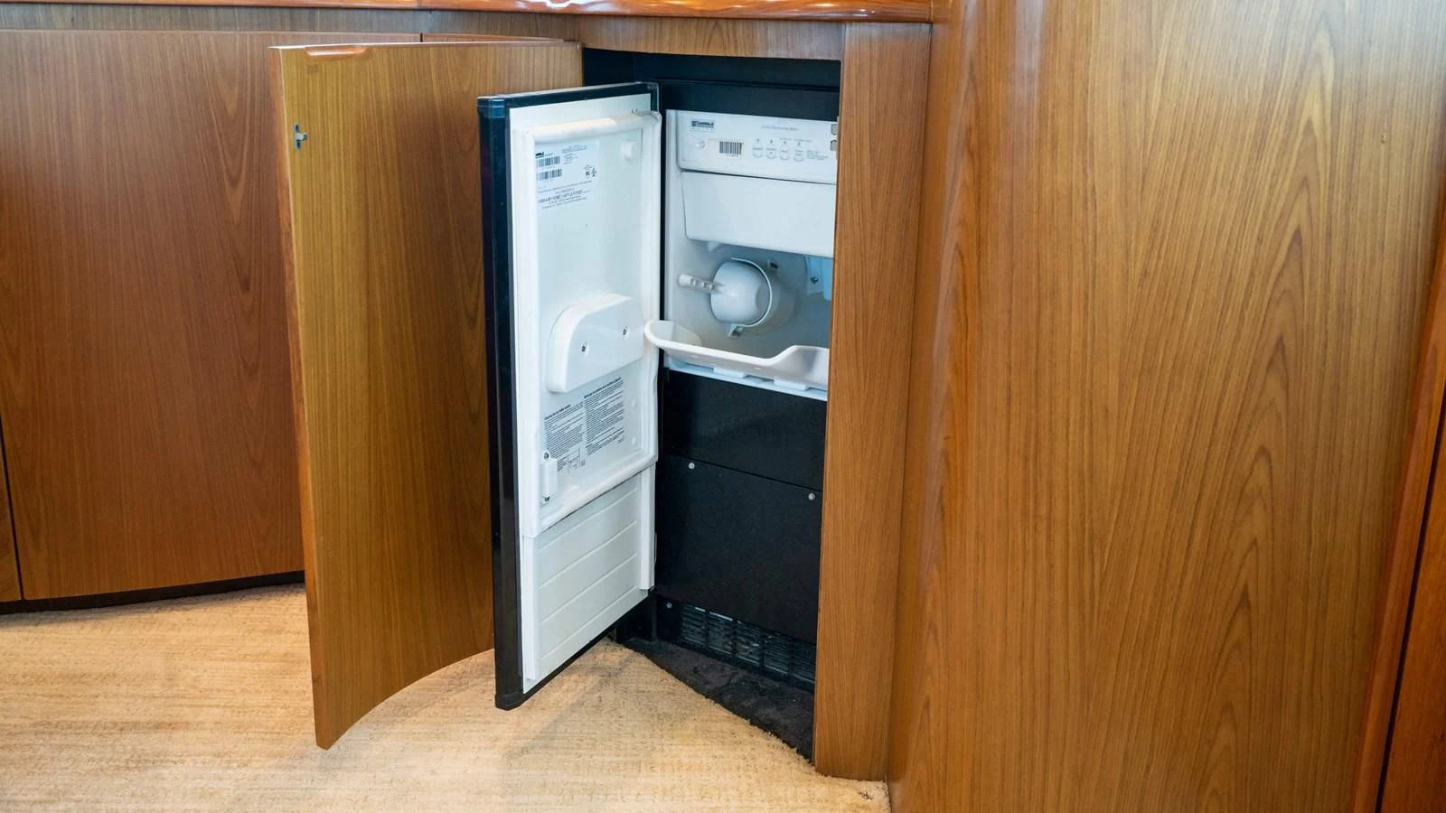a small kitchen with a microwave oven aboard DONE DEAL Yacht for Sale
