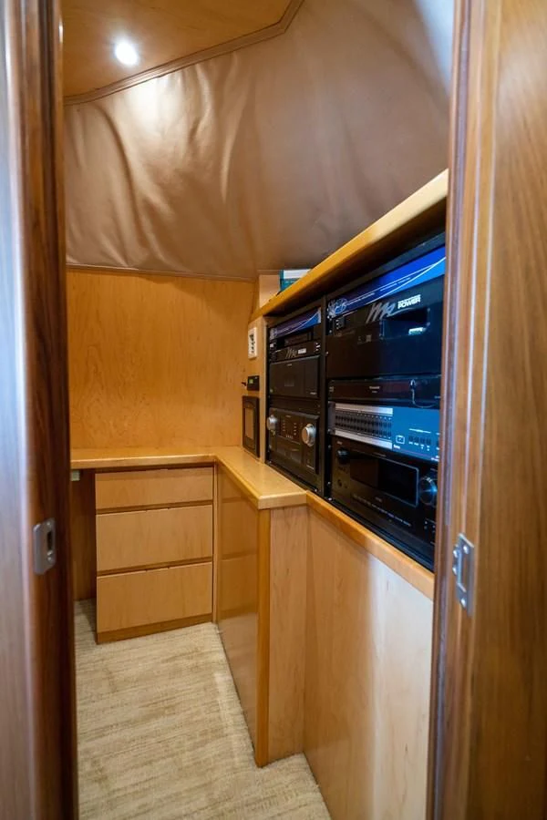 a room with a cabinet and a stove aboard DONE DEAL Yacht for Sale