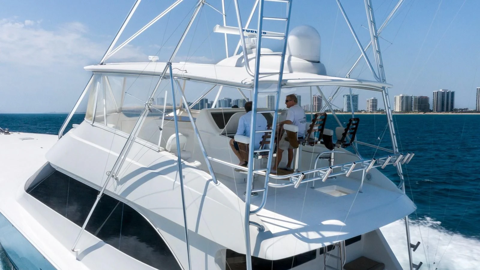 a couple of people on a boat aboard DONE DEAL Yacht for Sale