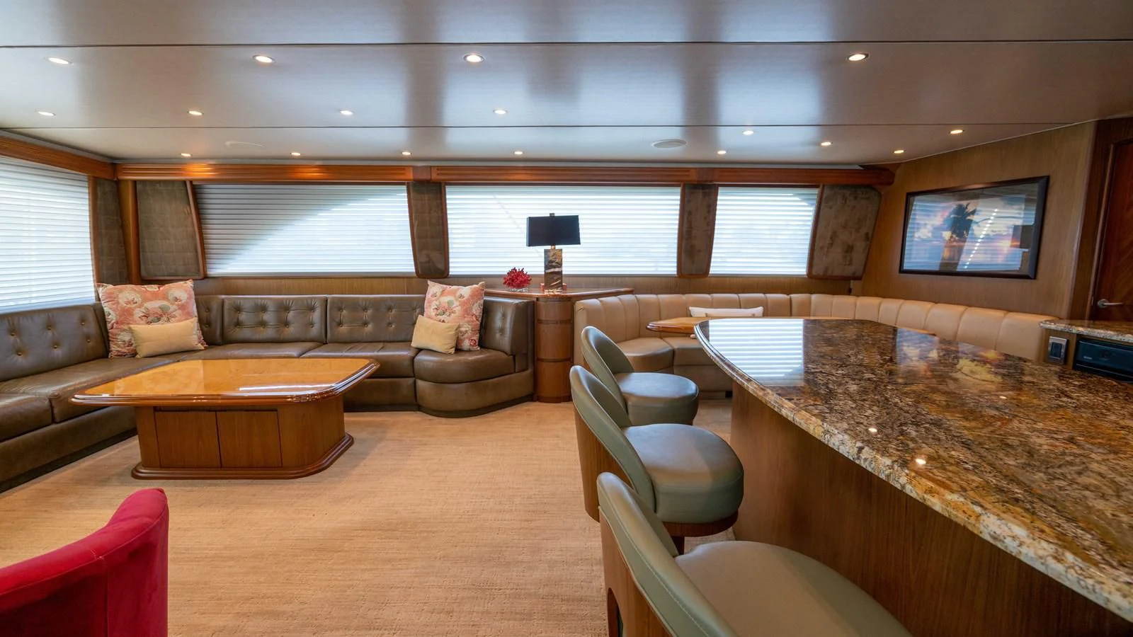 a living room with a table and chairs aboard DONE DEAL Yacht for Sale