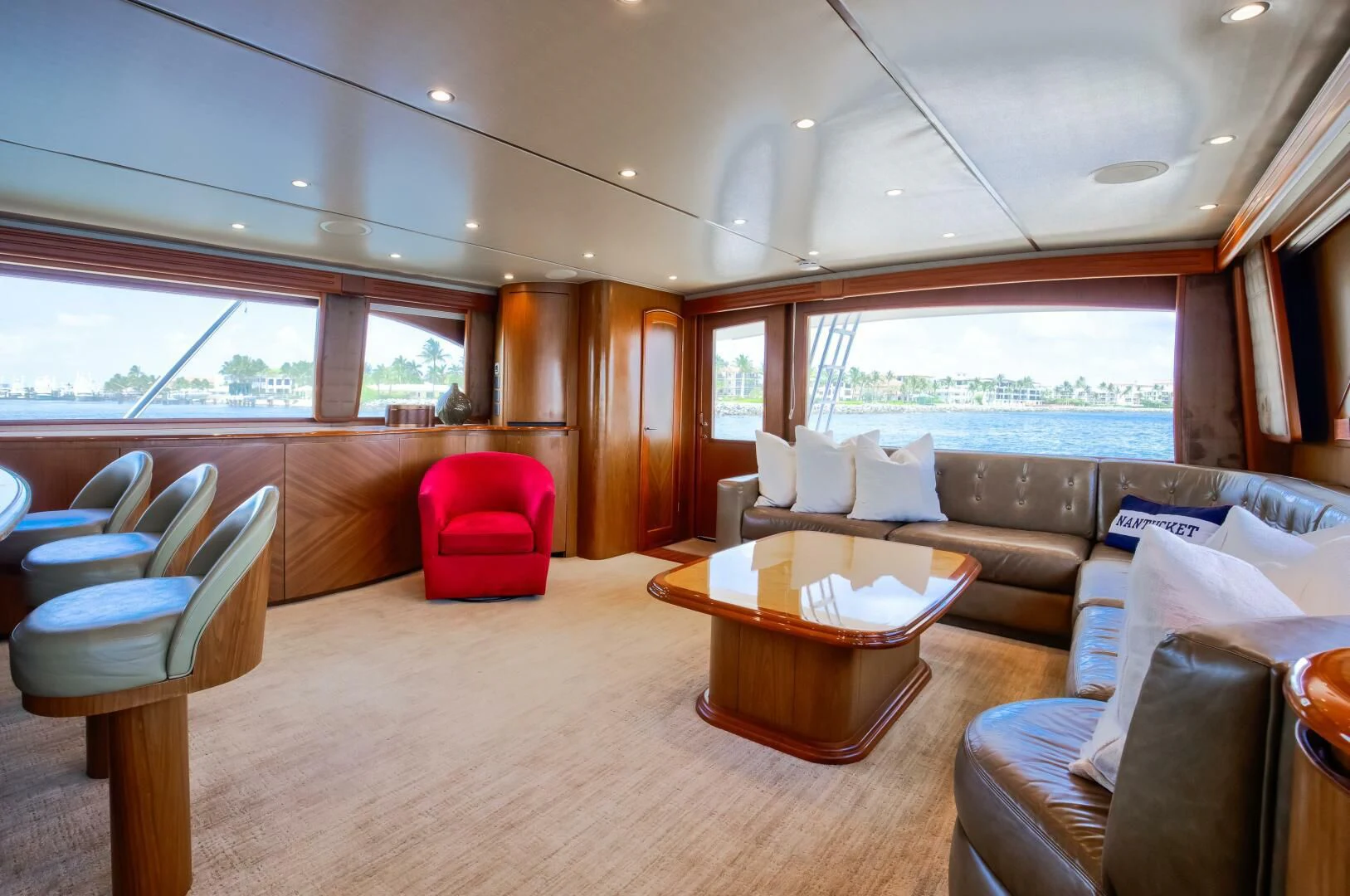 a living room with a couch and a table aboard DONE DEAL Yacht for Sale