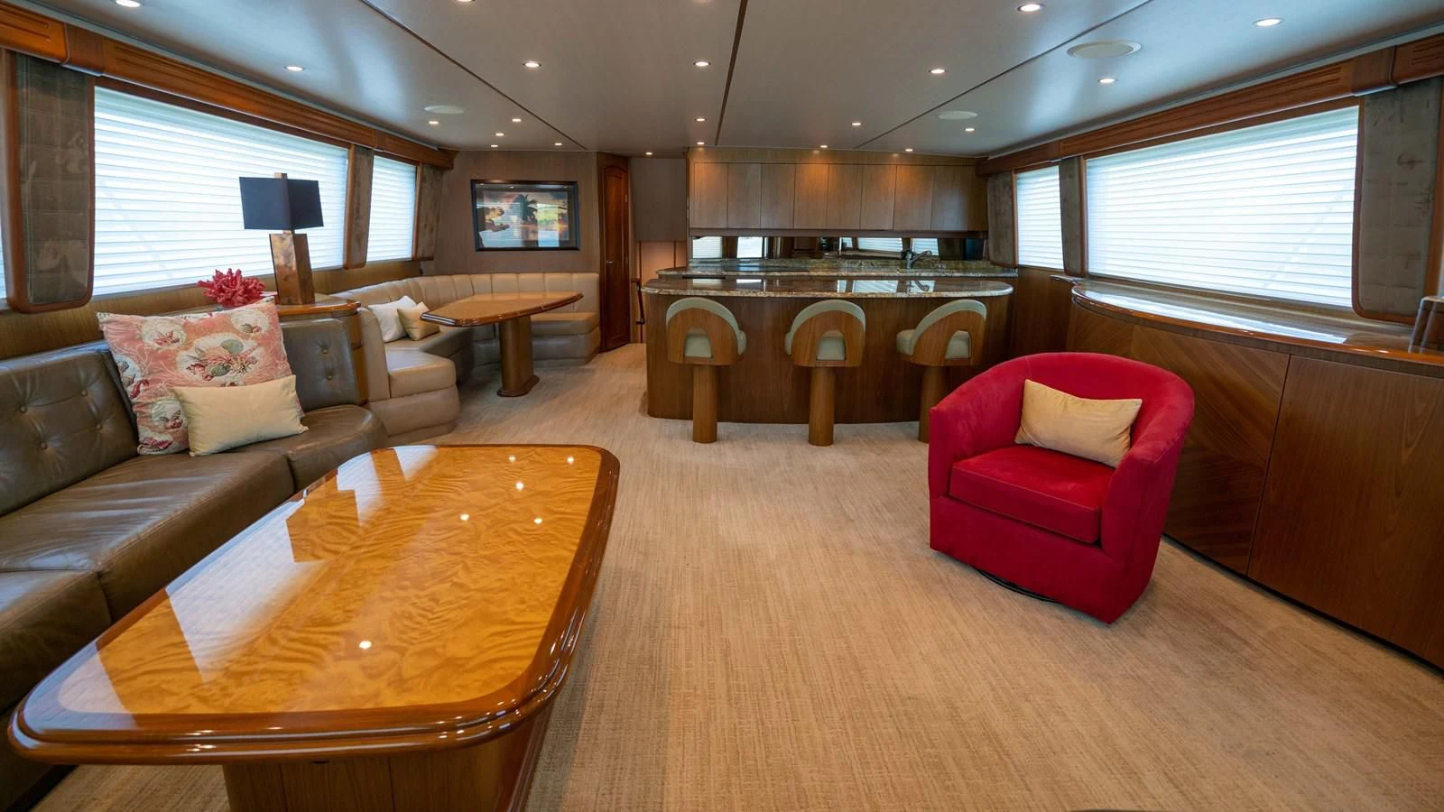 a living room with a table and chairs aboard DONE DEAL Yacht for Sale