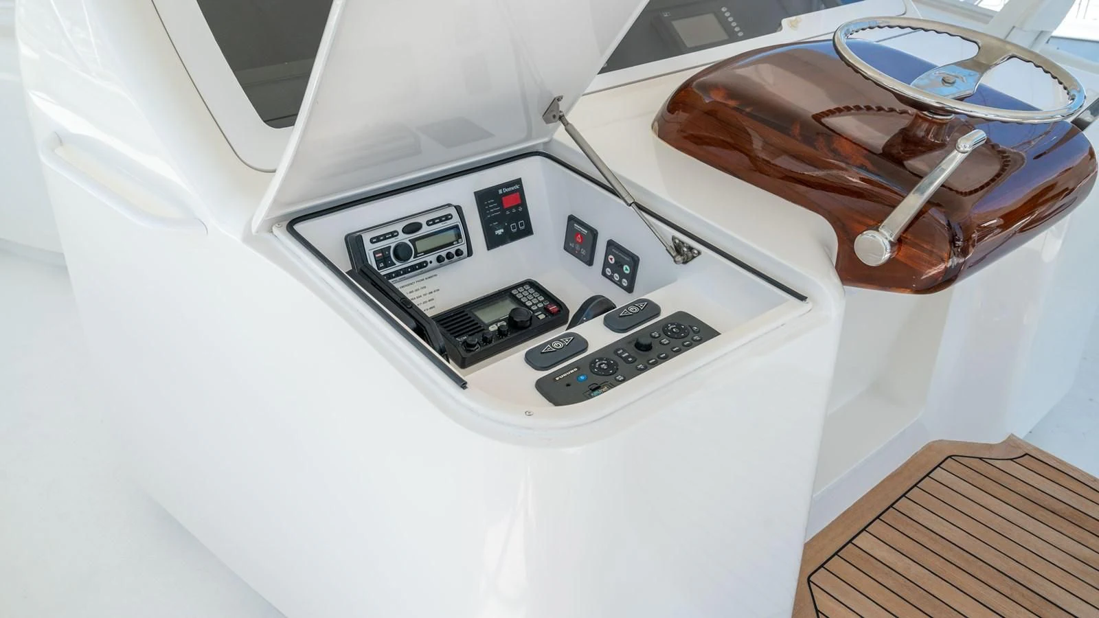 a white machine with a cord aboard DONE DEAL Yacht for Sale
