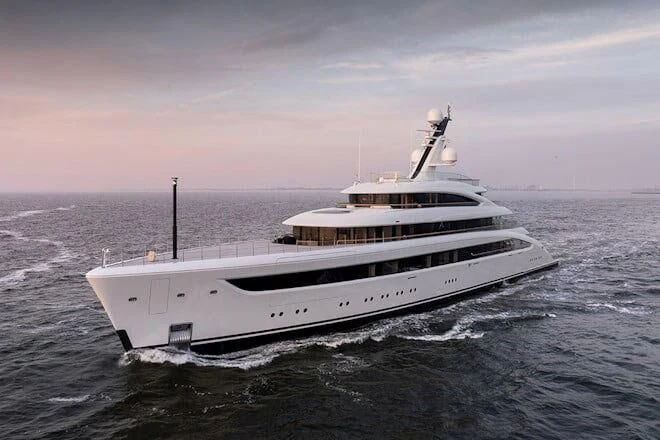 a white boat in the water aboard ALVIA Yacht for Sale