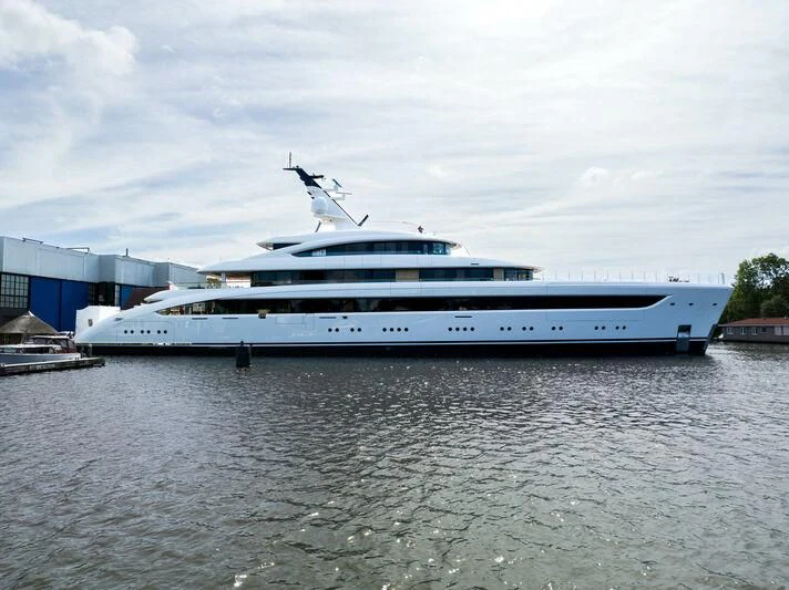 a large cruise ship in a harbor aboard ALVIA Yacht for Sale