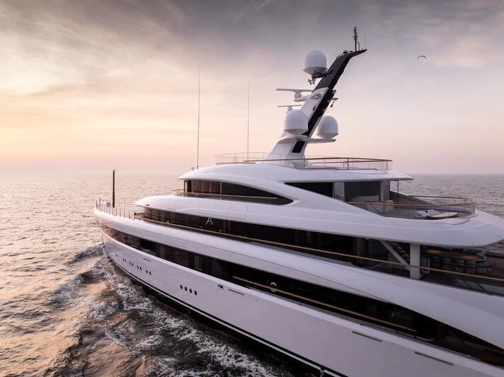 a white yacht on a beach aboard ALVIA Yacht for Sale