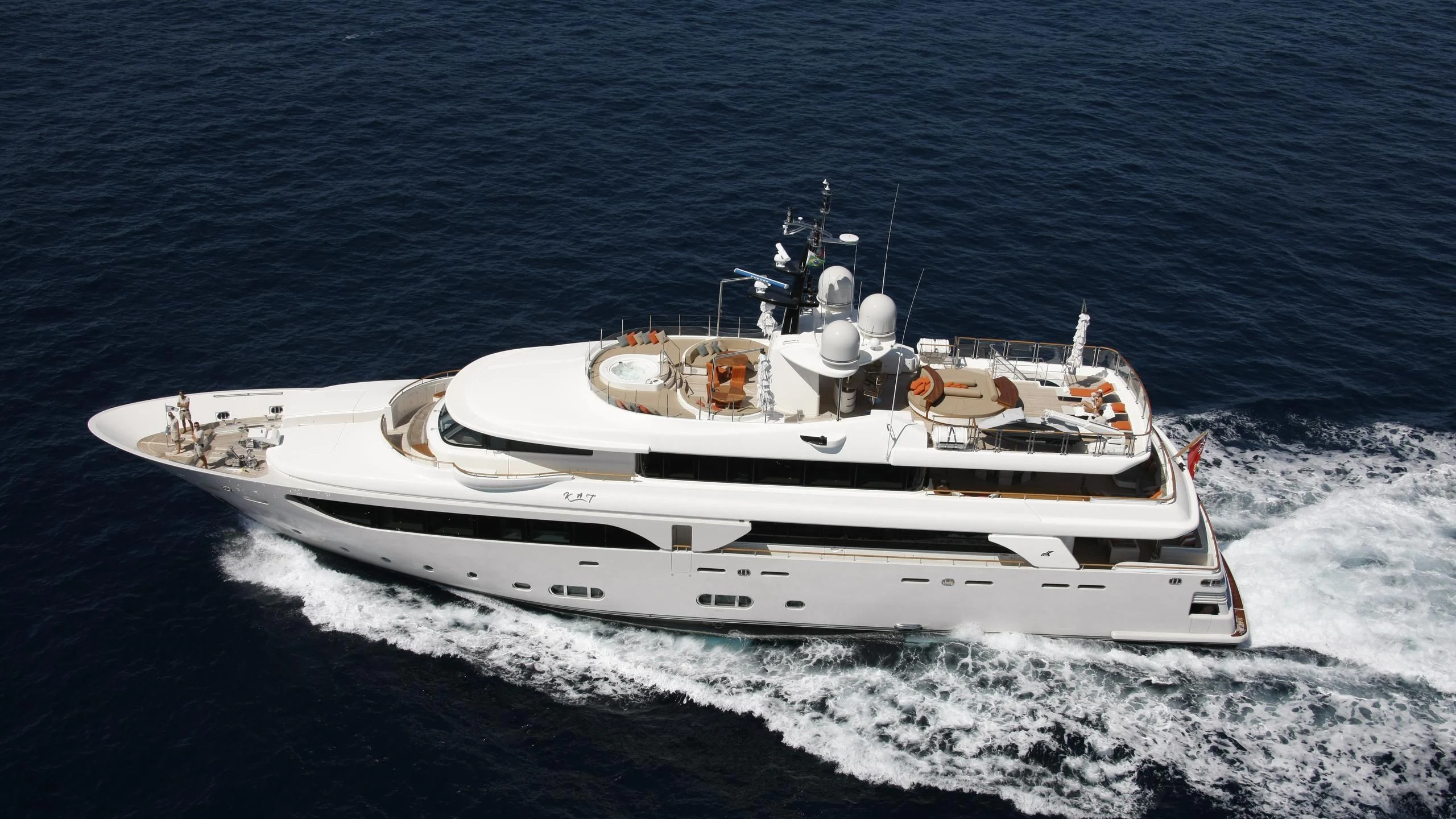 a white boat on the water aboard PHOTON Yacht for Sale
