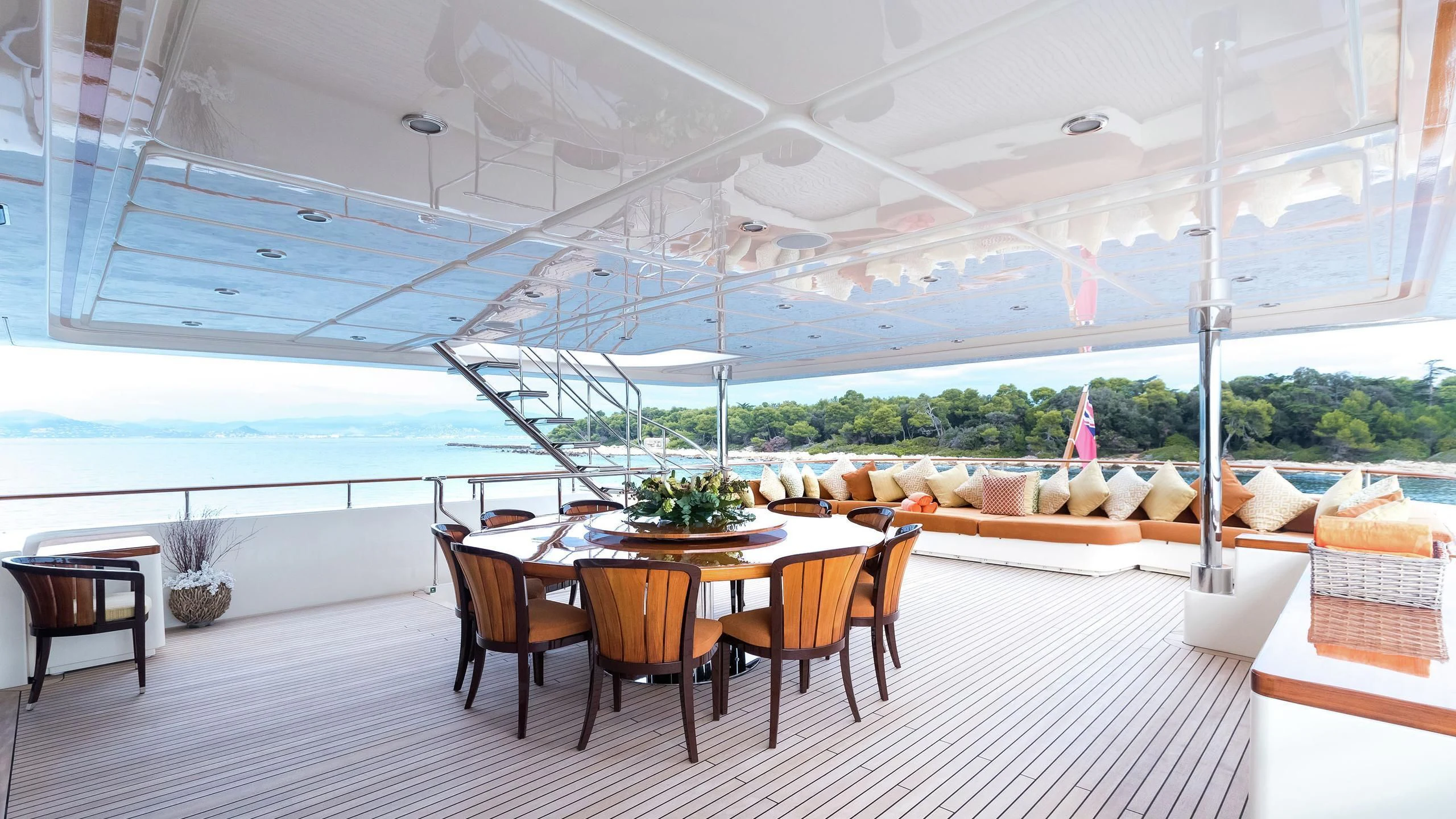 a table and chairs in a room aboard PHOTON Yacht for Sale