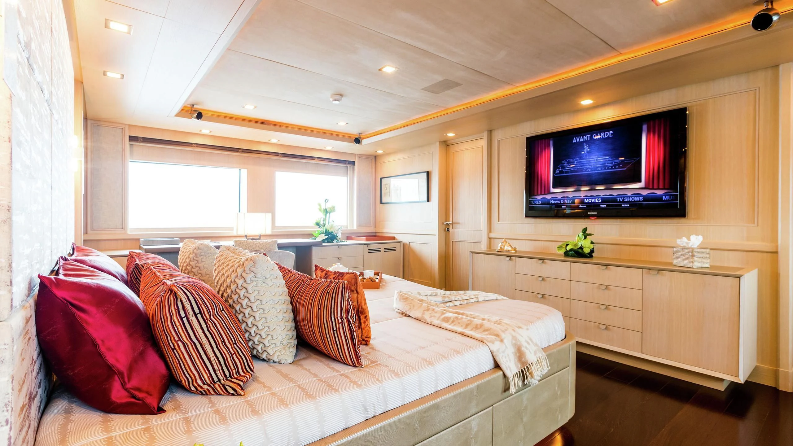 a bed in a room aboard PHOTON Yacht for Sale
