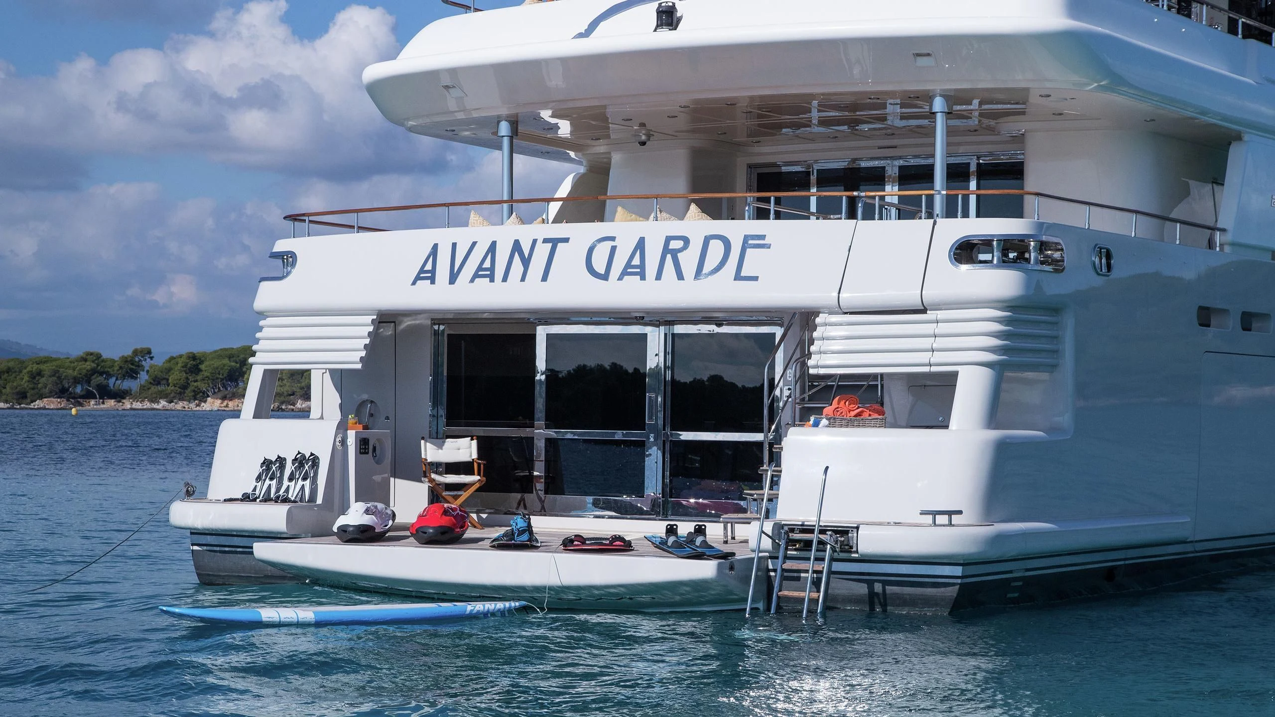 a boat docked at a pier aboard PHOTON Yacht for Sale
