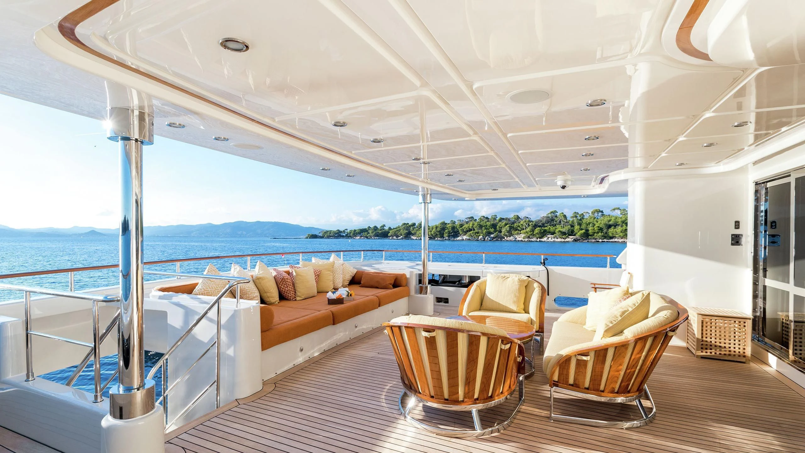 a living room with a large patio aboard PHOTON Yacht for Sale