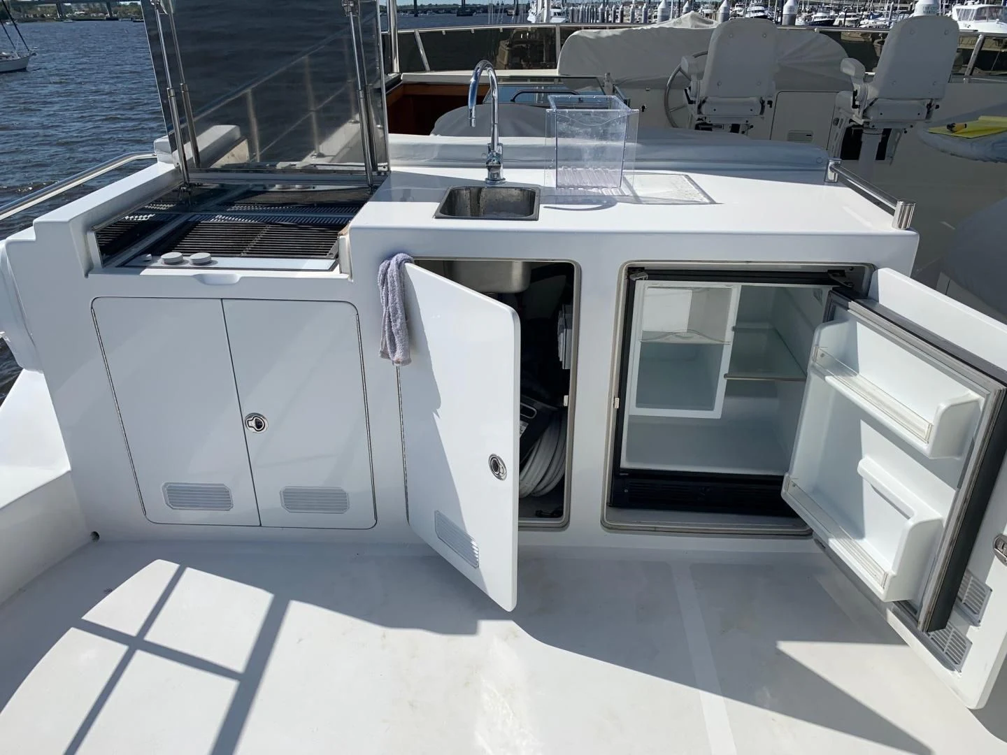 a white and black machine aboard LADY GIGI Yacht for Sale