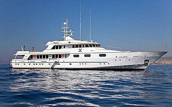 a large white boat in the water aboard X CHIOS Yacht for Sale