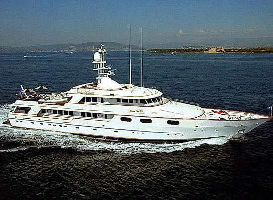 a large white boat on the beach aboard X CHIOS Yacht for Sale
