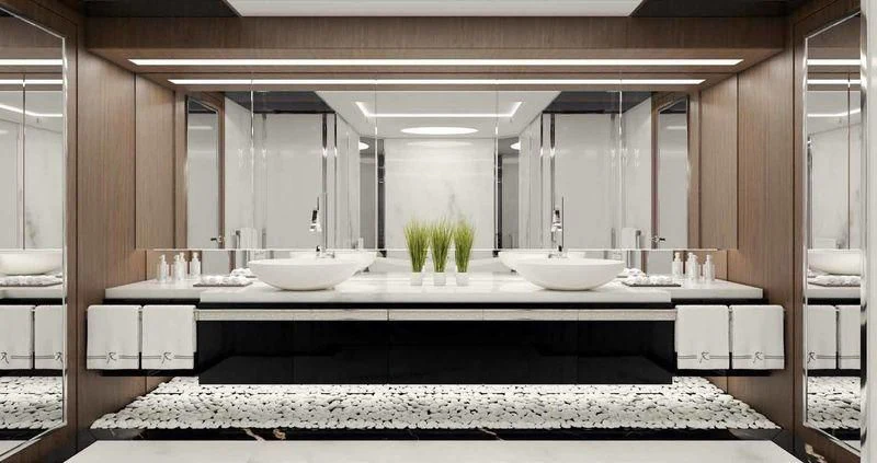 a bathroom with a large mirror aboard JEWELS Yacht for Sale