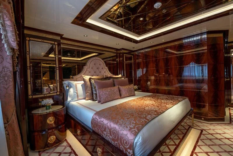 a bed in a room aboard JEWELS Yacht for Sale