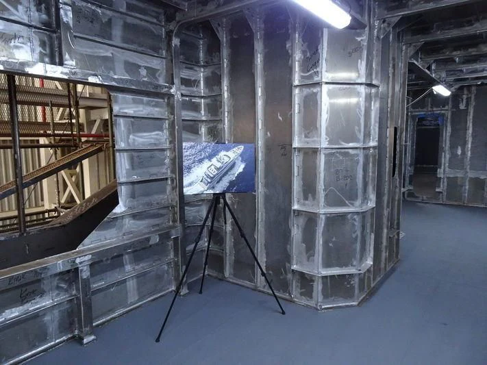 a large room with metal structures aboard JEWELS Yacht for Sale
