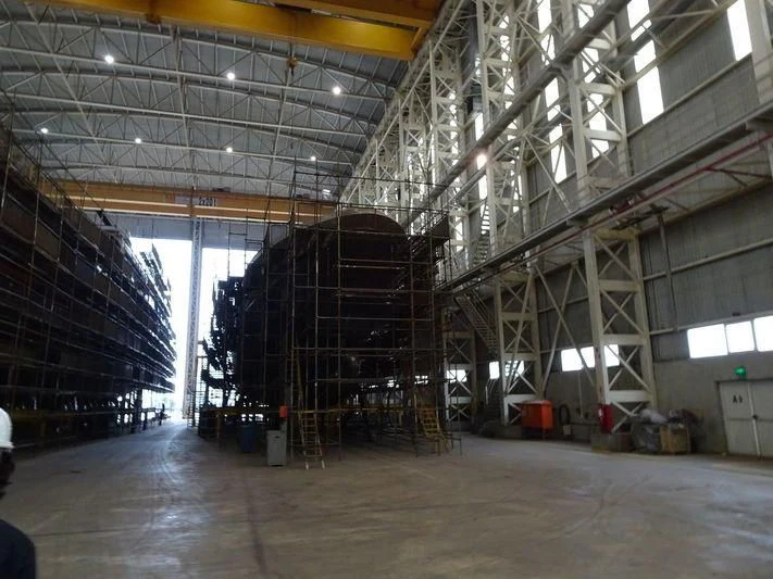 a large room with a large group of machines in it aboard JEWELS Yacht for Sale