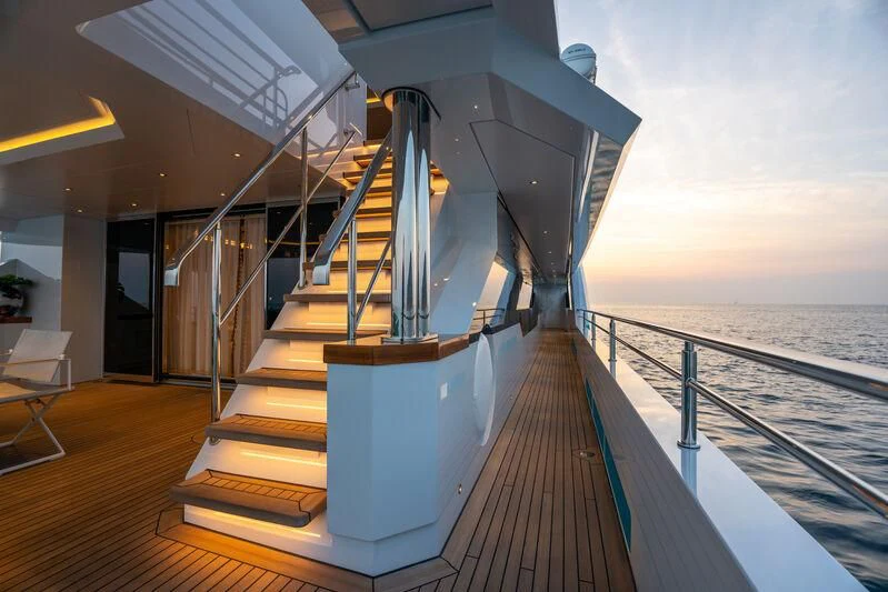 a long staircase leading to a beach aboard JEWELS Yacht for Sale