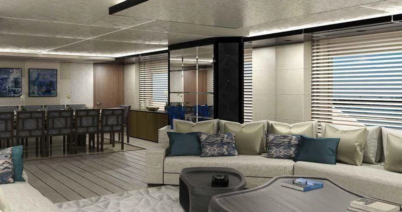 a living room with a couch and a table aboard JEWELS Yacht for Sale