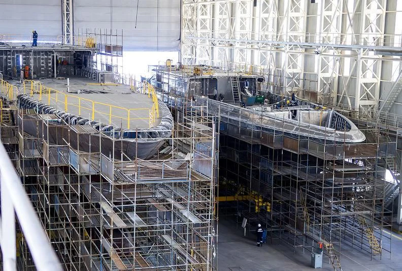 a large factory with white pipes aboard JEWELS Yacht for Sale