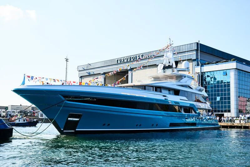 a boat docked at a pier aboard JEWELS Yacht for Sale