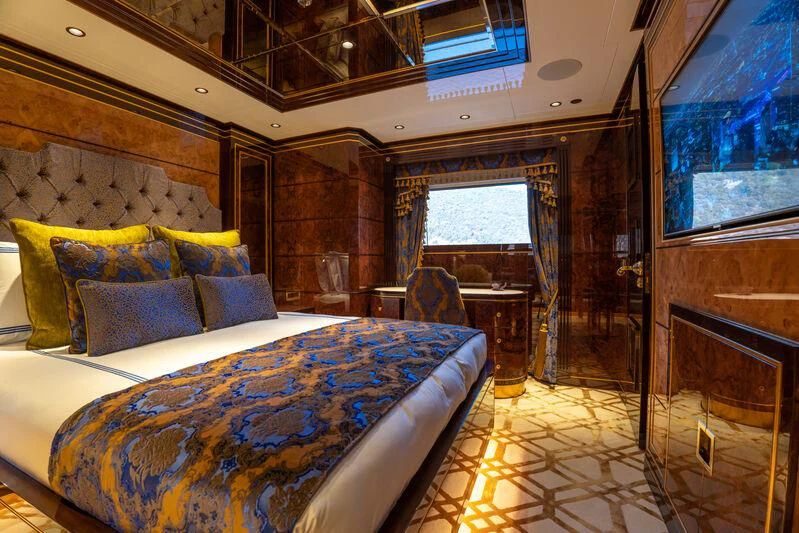 a bed in a room aboard JEWELS Yacht for Sale