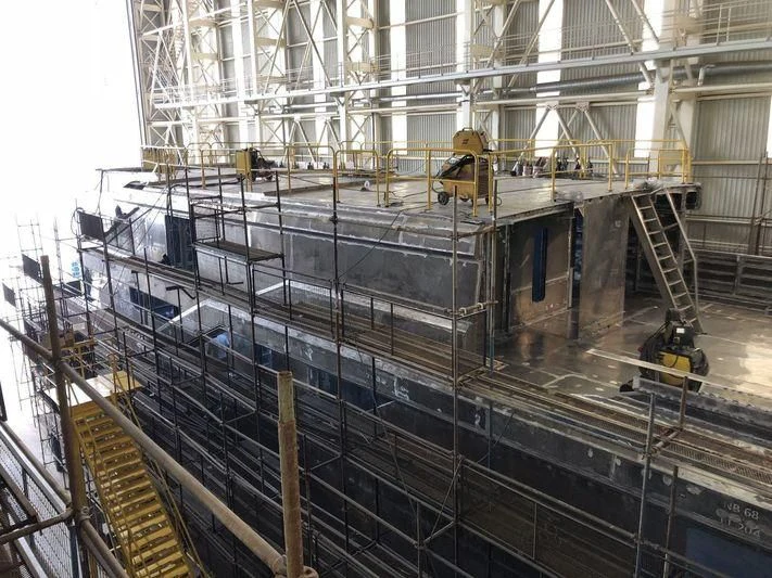 a large factory with several machines aboard JEWELS Yacht for Sale